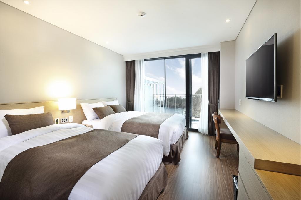 Hotel Fine Seogwipo Habitación foto