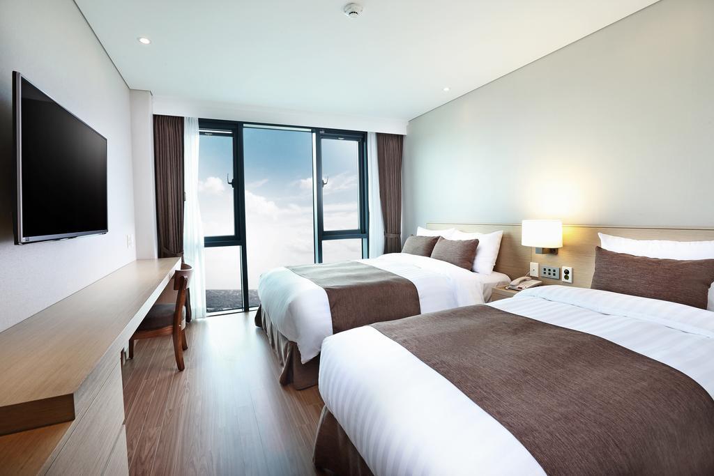 Hotel Fine Seogwipo Habitación foto